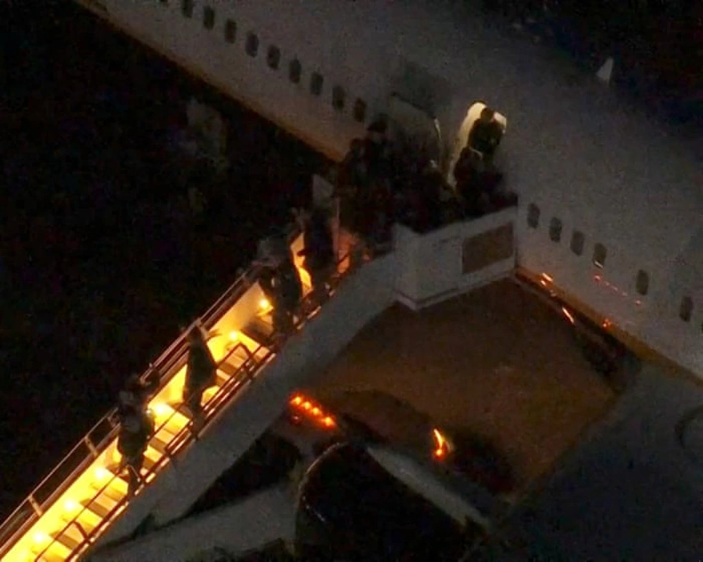 Hình ảnh đầu tiên của Tổng thống Venezuela sau khi được đưa tới Mỹ - 1